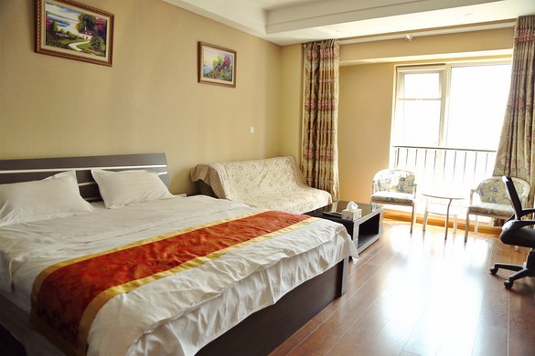 【图】大连高新万达爱丽公寓海景大床房_高新