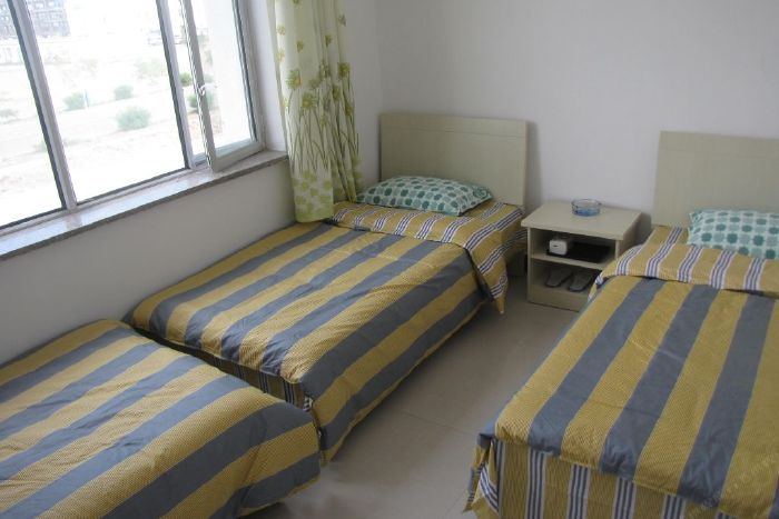 我家民宿(额济纳旗商服楼店)商服楼3人普间