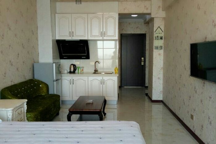 连住优惠超赞房东 满7天享9.9折日租公寓(万熹店) 5.