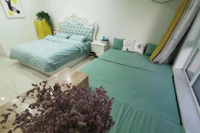 连住优惠闪订免费停车万达公寓榻榻米加大床温馨的小屋 5.